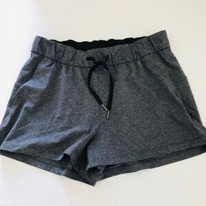 p7 LULULEMON womens ON THE FLY shorts size 10 EUC ** Dark grey **